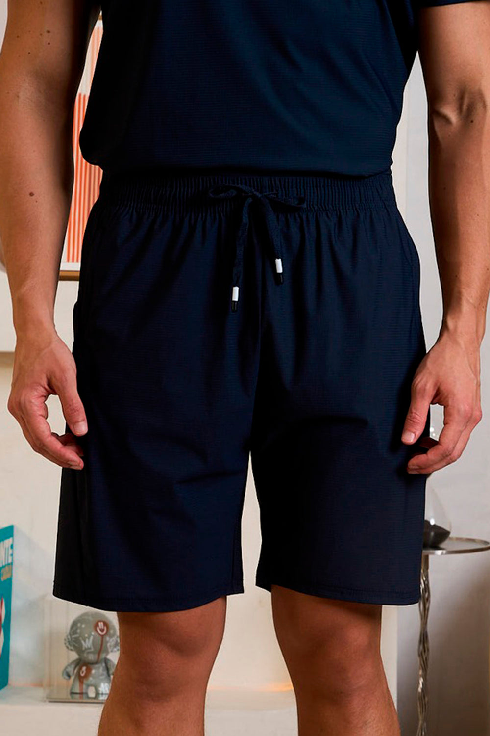 SHORT TECH COM ZIPER NO BOLSO